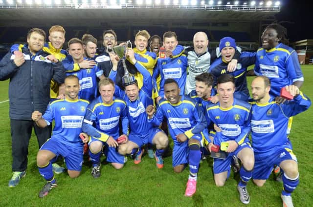 Peterborough Sports celebrate their Northants Junior Cup Final success at the ABAX Stadium. Photo: David Lowndes.