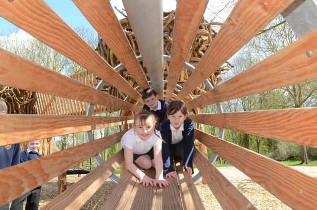 Pupils from KS2 at St Botolph's C of E school trying out the new play area facility at Ferry Meadows EMN-160427-153730009