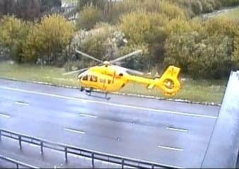 The Highways Agency photograph of the air ambulance landing on the A1