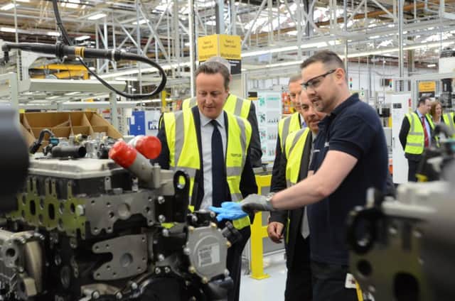 Prime Minister David Cameron visits Perkins Engines at Eastfield plant Caterpillar EMN-160428-161008009
