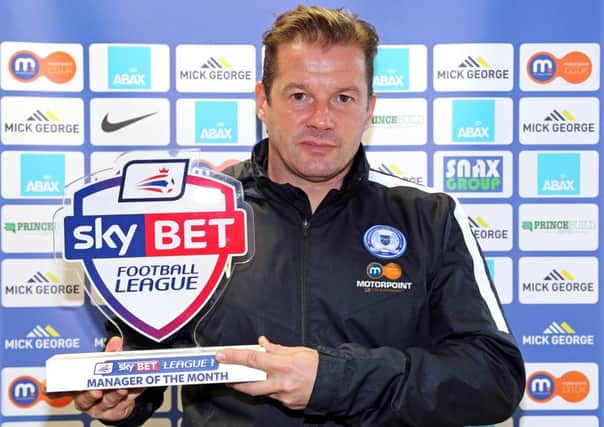 Graham Westley after winning the Posh manager-of-the-month award for November.