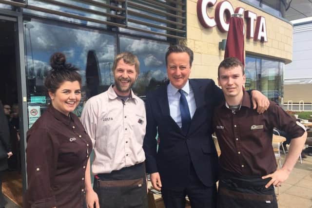 Staff from Costa at Brotherhood Retail Park with Prime Minister David Cameron