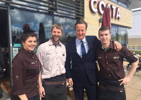 Staff from Costa at Brotherhood Retail Park with Prime Minister David Cameron
