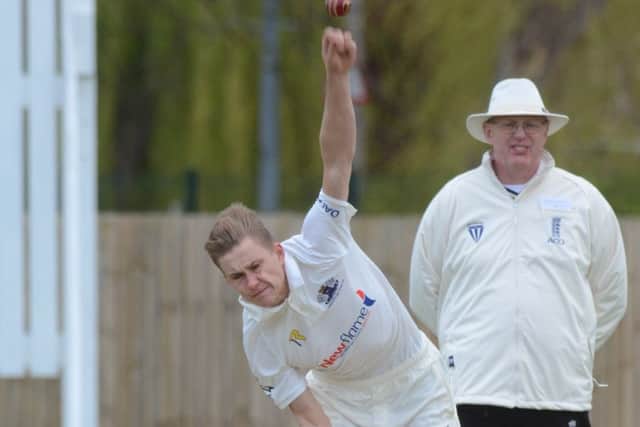David Sayer bowling for Peterborough Town against Wollaston.