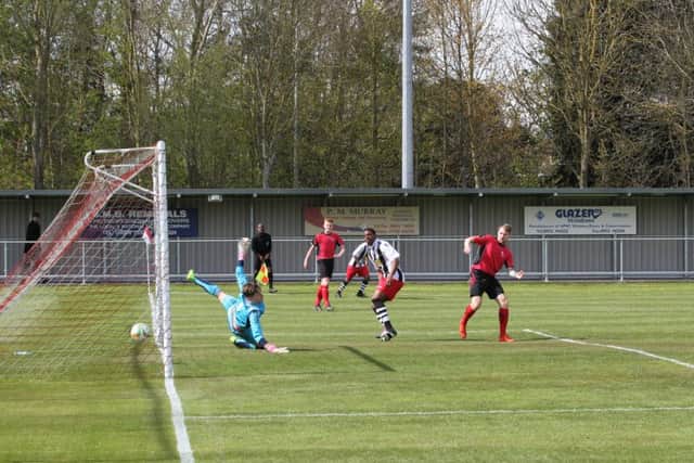 Jezz Goldson-Williams scores for Peterborough Northern Star at Sileby. Photo: Tim Gates.