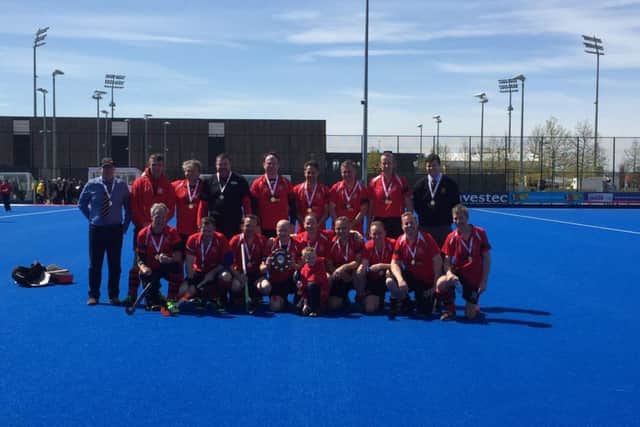 Wisbech Over 40s at the Olympic Park with their winners' medals.