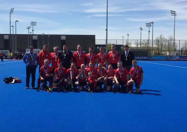 Wisbech Over 40s at the Olympic Park with their winners' medals.