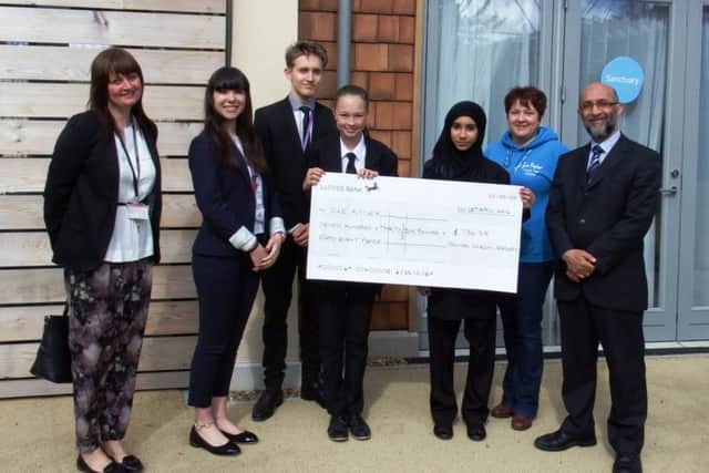 Pictured above: Tina Roberts, Frederica Cartucho, Joshua Blooodworth, Oliwia Kula, Salka Zohad, Joanne Marriott, Zulfikar Sayeed EMN-161005-103702001