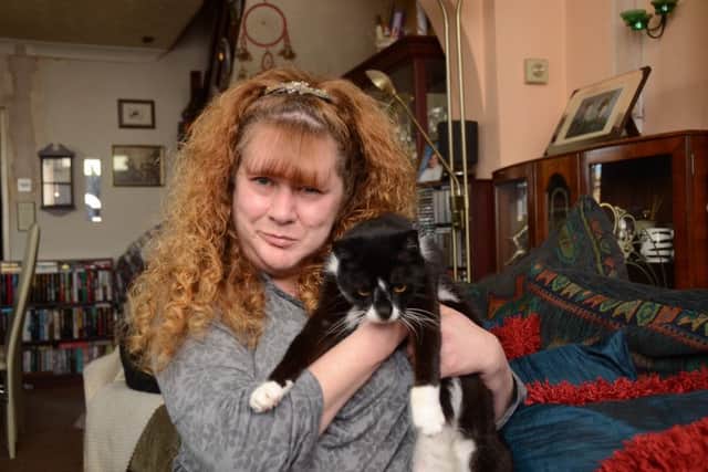 Charlie Rycroft with her cat Baggy Bagpuss at home at Glenton Street EMN-160405-170403009