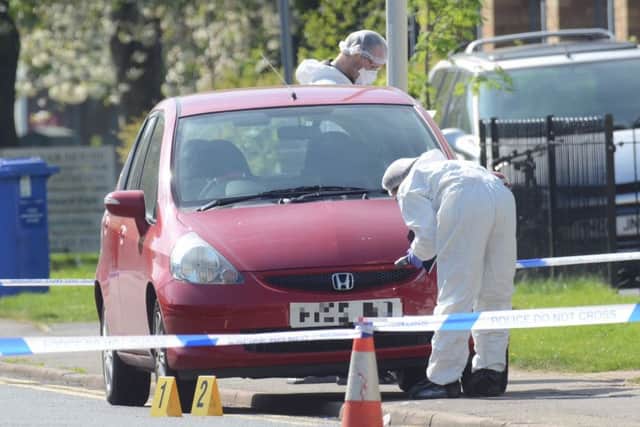Forensic officers in Shrewsbury Avenue