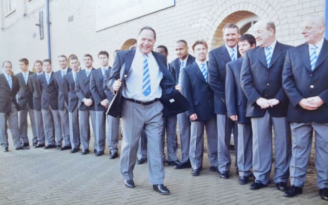 Suited and booted.. Barry Fry with Posh players and officials in 1998, but why?