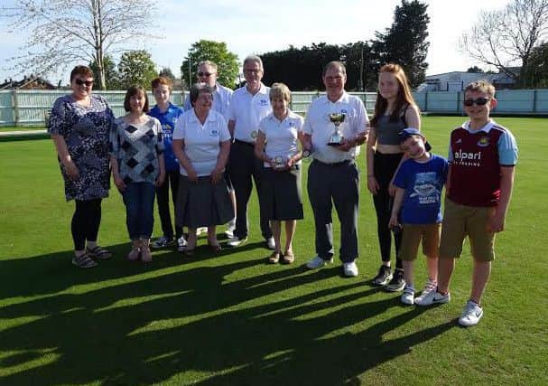 Jessica Phillips and her family were on hand at the City of Peterborough club on Sunday to present the Tony Phillips Memorial Cup, a drawn triples tournament, to David Heffernan, Norma and Malcolm Squires.