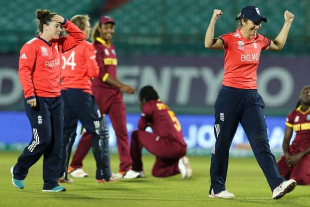 Charlotte Edwards (right) celebrates an England win.