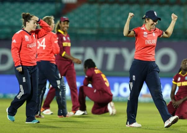 Charlotte Edwards (right) celebrates an England win.
