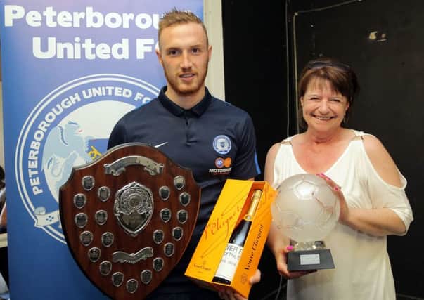 Marcus Maddison with his player-of-the-year prize.