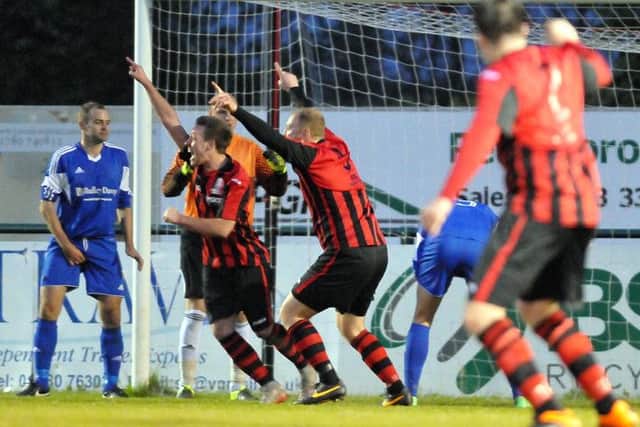 Pinchbeck celebrate the match-winner. Photos by Tim Wilson