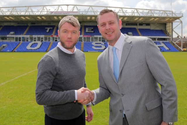 Posh chairman Darragh MacAnthony with new manager Grant McCann. Photo: Joe Dent/theposh.com.