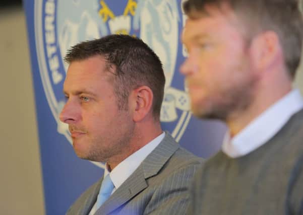 Chairman Darragh MacAnthony (left) at the Posh press conference with new manager Grant McCann. Photo: Joe Dent/theposh.com.