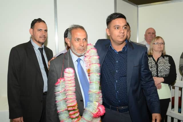 Cllr Gul Nawaz (blue tie) at the local election count