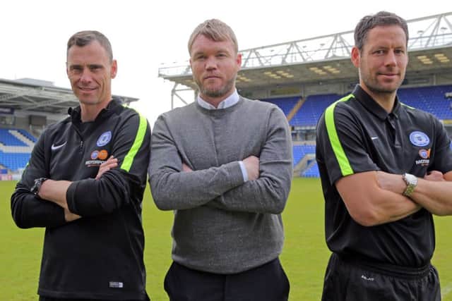 Posh legends who will now be running the first-team, from left, David Farrell, Grant McCann, Mark Tyler. Photo: Joe Dent/theposh.com.