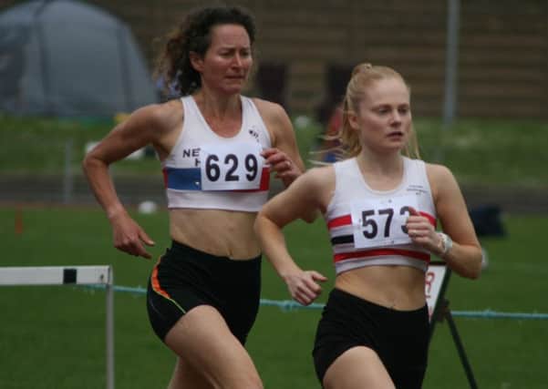 Philippa Taylor (left) won the veterans 1500m.