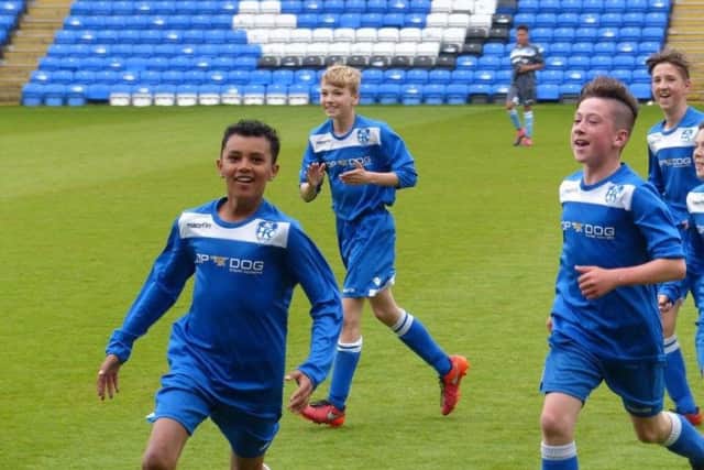 Rio Smith celebrates his goal for Hampton Under 13s against Alconbury in the PFA Cup Final at the ABAX Stadium.