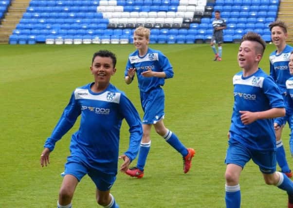 Rio Smith celebrates his goal for Hampton Under 13s against Alconbury in the PFA Cup Final at the ABAX Stadium.
