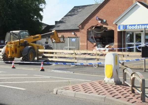 The scene after an ATM raid at the Co-operative Foodstore in Bridge Road, Sutton Bridge.