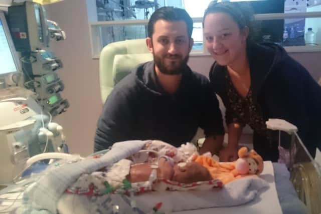 Chris and Jade Milner with Freddie
