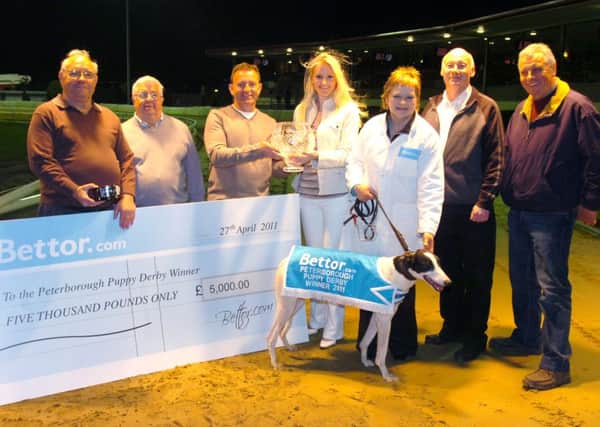Pictured is the 2011 Peterborough Puppy Derby presentation. The race was won by Monleek Sloopy from trap four. From the left are Roger Kinch, David Tailby, Steve Donaldson, sponsor Jayne Clarke, Debbie Pruhs, Mick Gough and Dave Pruhs.