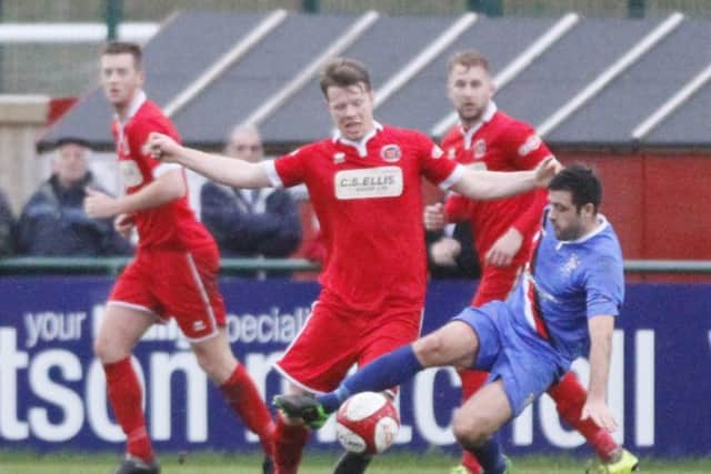 Action from a Stamford AFC match at the Zeeco Stadium last season.