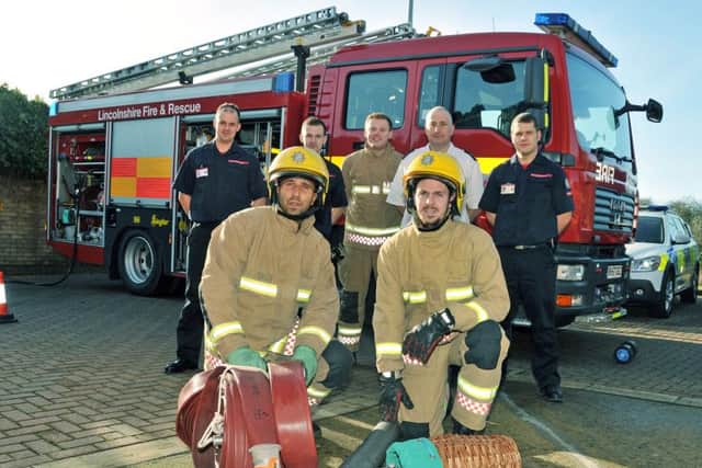 Crowland Fire Station staff (back) Jason Harrison, Bobby Harrison, Grant Newman, Stuart Hannible and Kevin Glover, (front) with Michael Smith and Pep Giuliano of Giuliano's Italian Restaurant, Crowland. Photo by Tim Wilson.