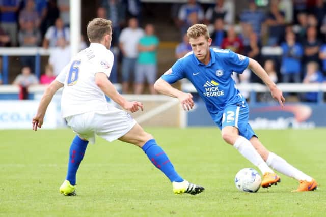 Callum Elder (right) in action for Posh. Photo: Joe Dent/theposh.com.
