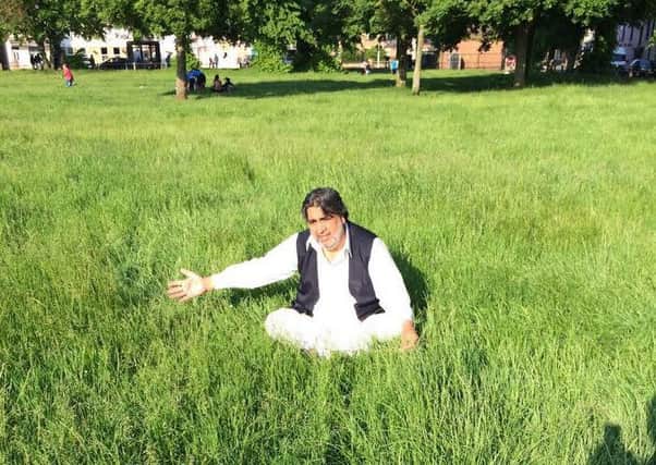 Mohammed Sabir is among those concerned about th length of the grass in Rock Park, Peterborough.