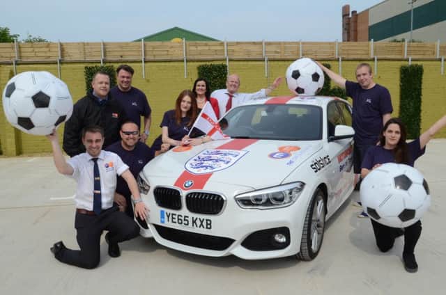 Staff and owners of the Solctice and staff from Motorpoint getting ready for the England games to be shown at the pub EMN-160706-201903009