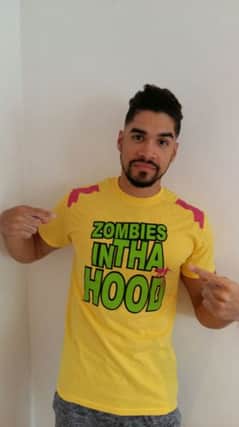 Louis Smith, who makes a cameo appearance,  with an official T-shirt