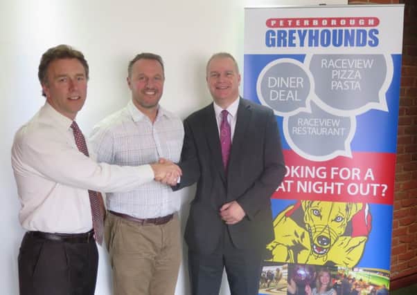New deal, from left, stadium directors Richard and Rob Perkins with Ken Craig of Rawlinsons.