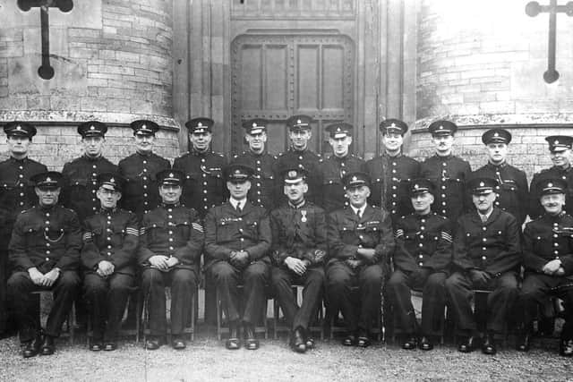 Wardens during World War 2 pose outside the Sessions House