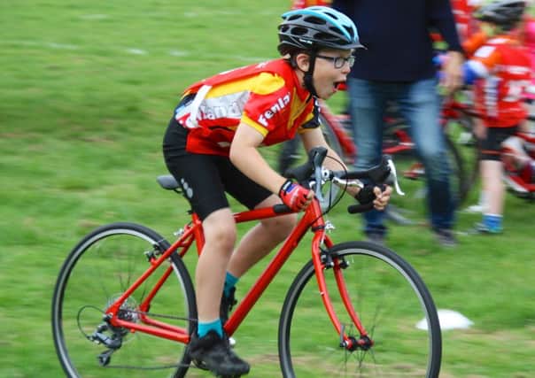 Harry Tozer wins a race at the Fenland Clarion youth grasstrack meeting.