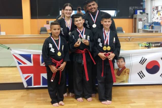 European Championship medal winners from Peterborough Kuk Sool Won were from the left, back, Samantha Elwes, Jay Samko, front, Nikolas Samko, Jaroslav Samko and Martin Samko.