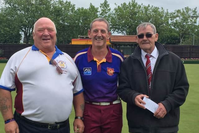 Trevor Collins (centre), who made his 100th Middleton Cup appearance on Saturday, is pictured with Hunts team manager Bob Morton (left) and county vice-president Ray Keating.