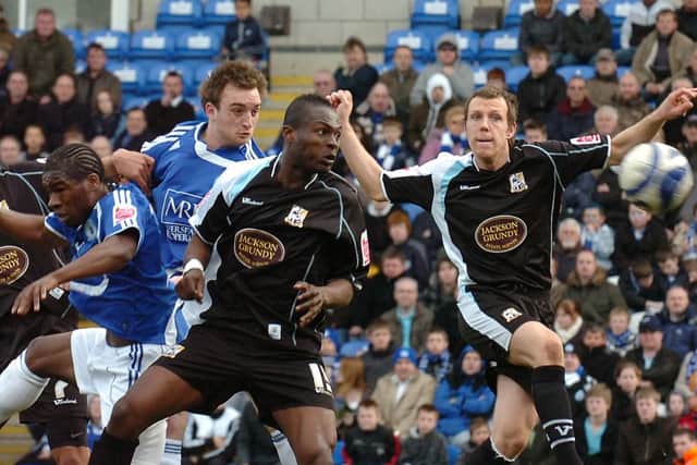 Charlie Lee heads the winning goal for Posh in their last competitive meeting with Northampton Town in March, 2009. Photo: David Lowndes.