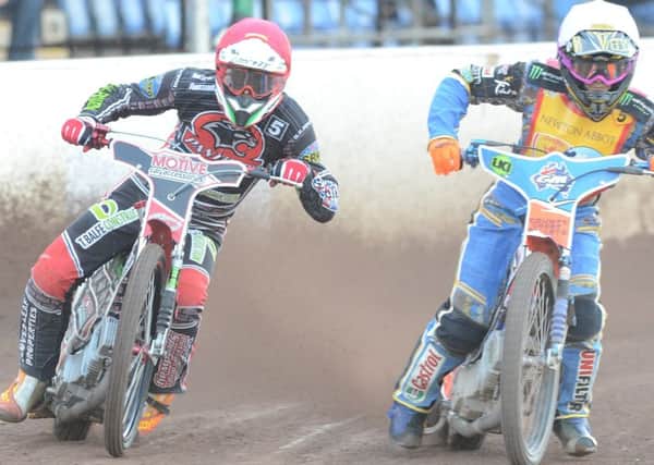 Ulrich Ostergaard (left) in action against Plymouth Devils. Picture David Lowndes