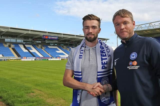 Gwion Edwards with Grant McCann - Photo: Joe Dent