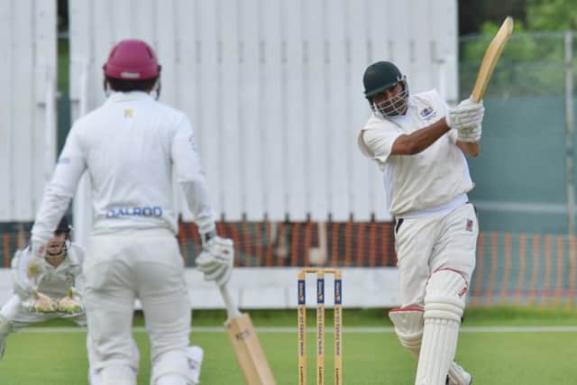 Peterborough Town's Ajaz Akhtar is about to get caught in the T20 defeat to Rushton. Photo: David Lowndes.