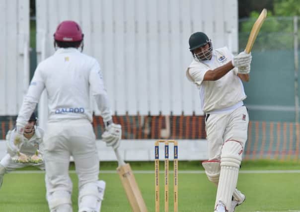 Peterborough Town's Ajaz Akhtar is about to get caught in the T20 defeat to Rushton. Photo: David Lowndes.