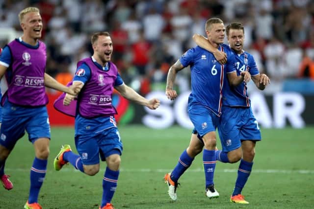 Iceland celebrate their win over England.