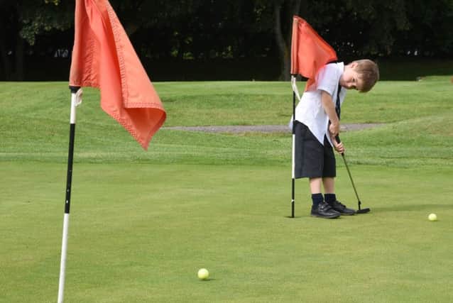 Five year-old golfer Bobby Moore practicing at Thorpe Wood golf course before he leaves for a golf tournament abroad EMN-160627-223927009