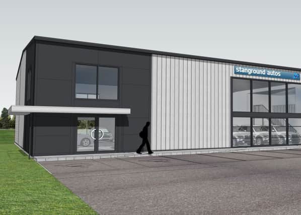 An image shows how Stanground Autos' new showroom should appear once completed.