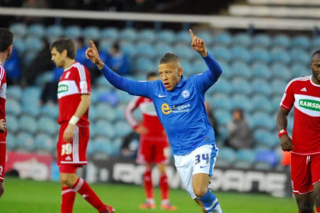 Dwight Gayle celebrates a Posh goal.